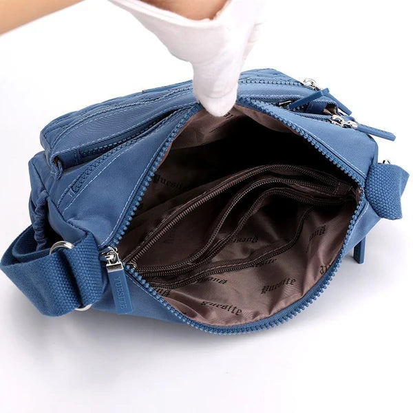 👜Lightweight Waterproof Nylon Messenger Bag – Multi Compartments🎁
